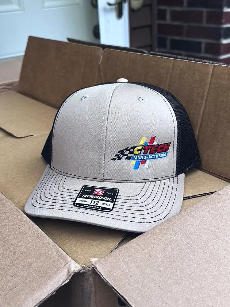 Tan and brown trucker cap with embroidered CTech Manufacturing racing flag logo, made by Patch Adams Promo in Wausau, WI