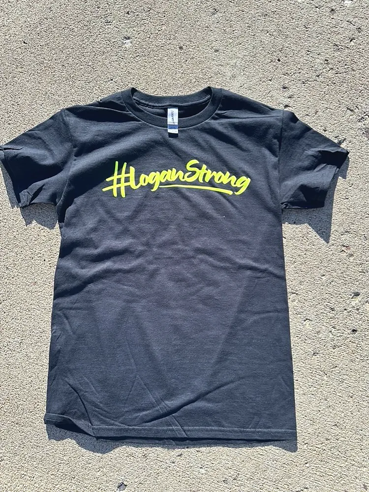 Black custom t-shirt with a neon yellow #LoganStrong benefit shirt print made in Wausau, WI