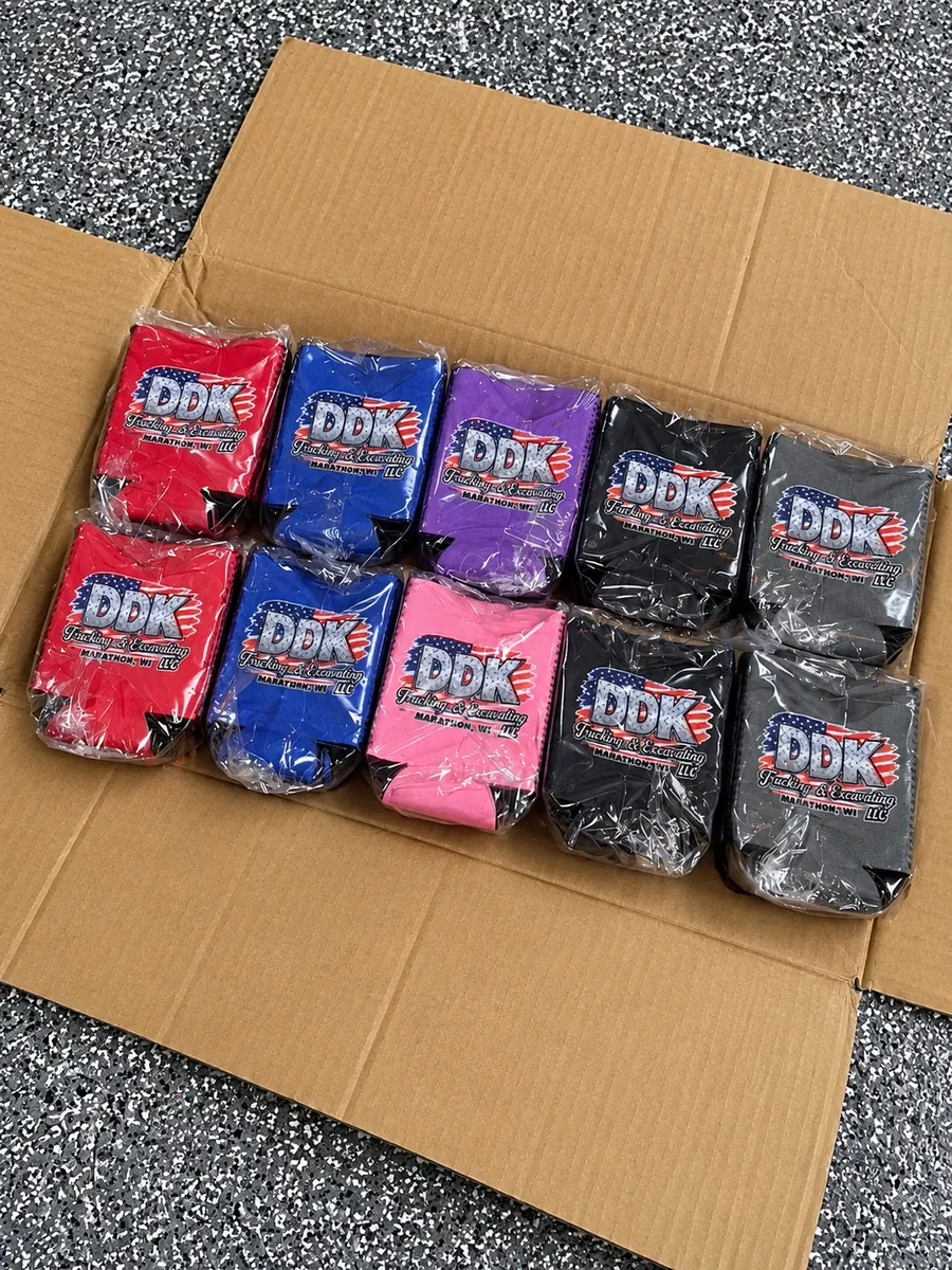 Ten custom can coolers in red, blue, purple, pink and black with a DDK Trucking and Excavating logo, promotional koozies from Patch Adams Promo in Wausau, WI